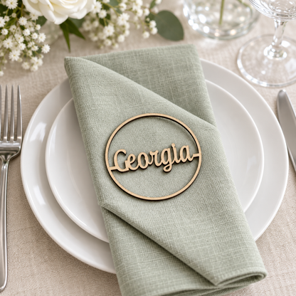 Round laser cut MDF wedding place name Georgia on sage linen
