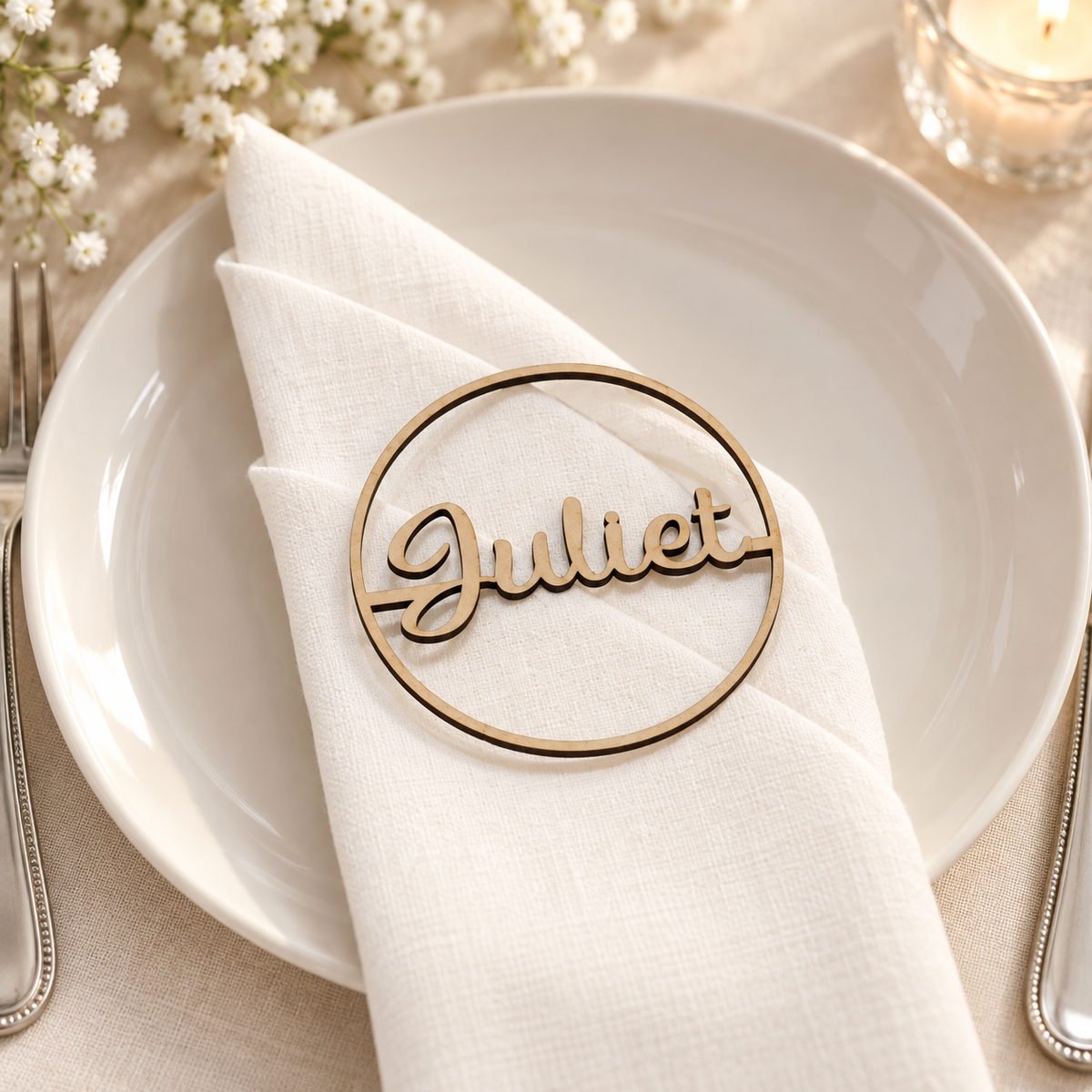 Round laser cut MDF wedding place name Juliet on ivory linen