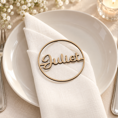 Round laser cut MDF wedding place name Juliet on ivory linen