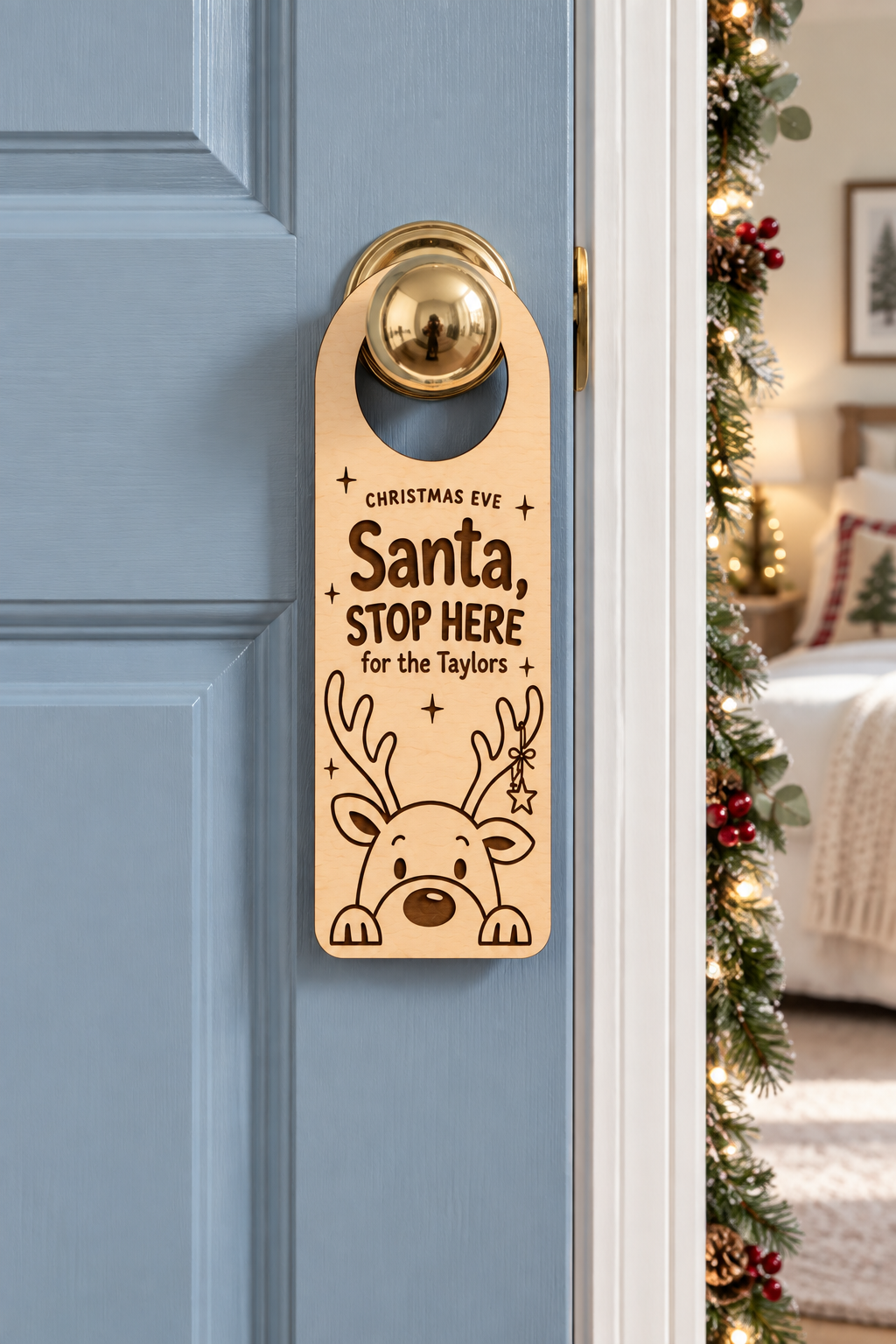 Personalised wooden Santa Stop Here Christmas door hanger for the Taylors, with engraved reindeer and closed hanging hoop